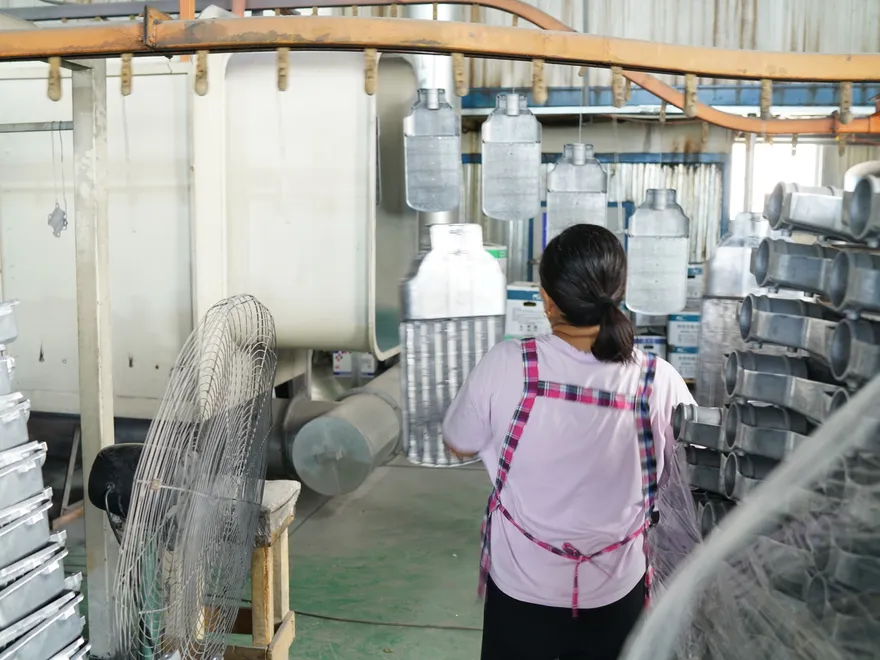 Powder-coating conveyor line for LED light housings at Sunjoylight factory