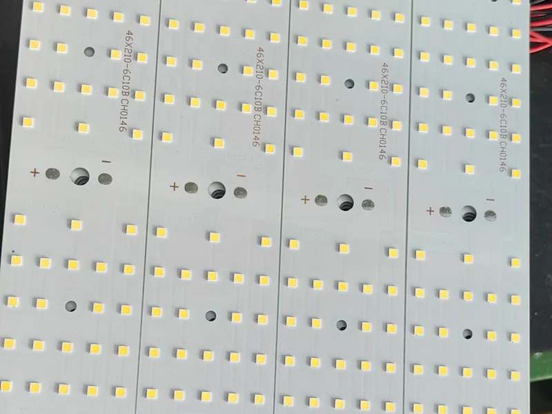 Aluminum LED circuit boards for high bay lights, populated with rows of high-efficacy SMD LED chips